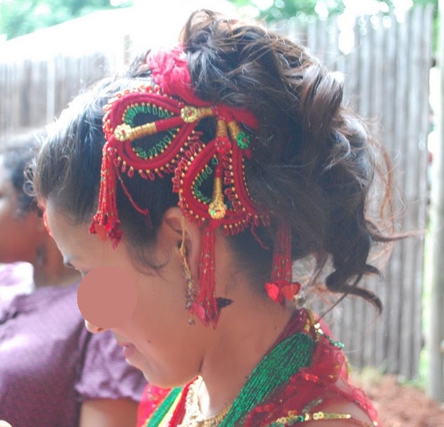  wedding hair style complete with traditional red dori hair decoration