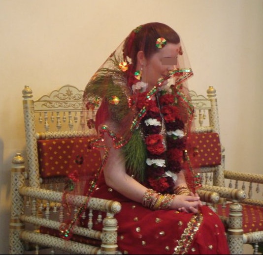 Me sitting under the mandap during the ceremony wearing the dubo ko mala 